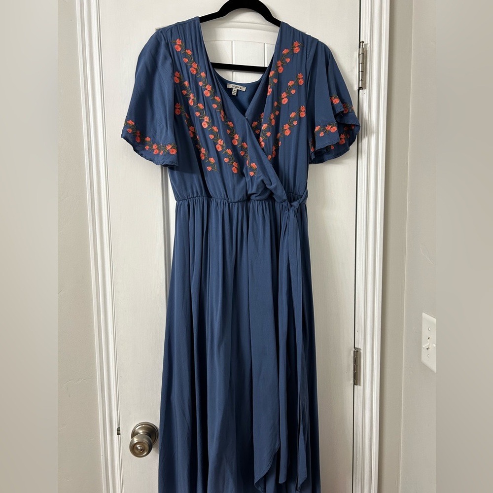 Wrapped dress blue and flowers. Got it at piper and schoot